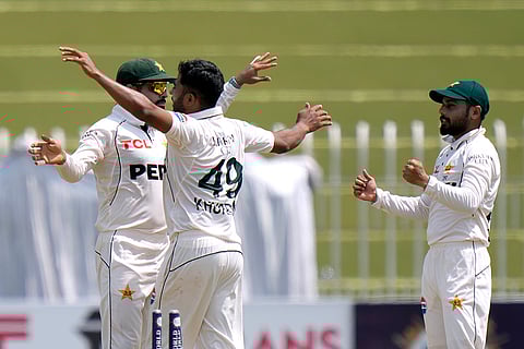 Pakistan vs Bangladesh 1st Test, 3rd Day: Pakistan's Khurram Shahzad, center, celebrates with teammates after taking a wicket